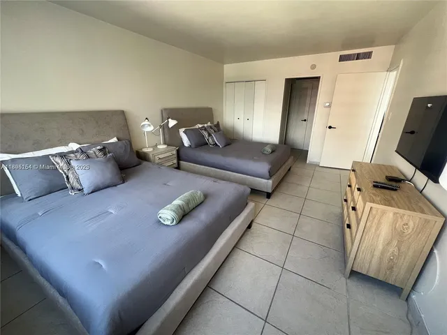 a bathroom with a shower and toilet