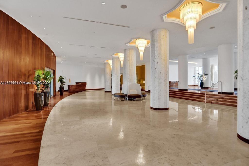 5161 Collins Avenue, Unit 1211 Miami Beach, FL 33140 - Photo 21 of 29 an entryway and hall with living room