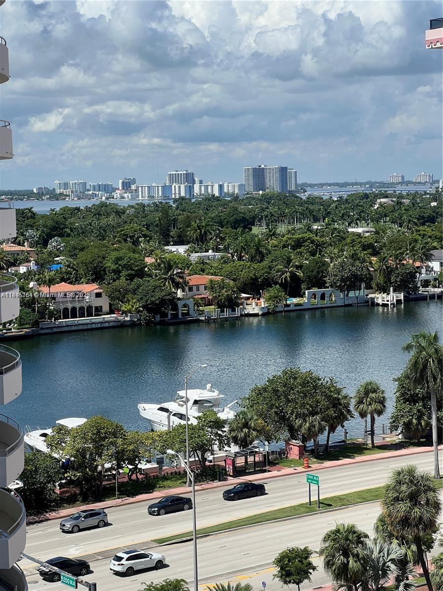 5161 Collins Avenue, Unit 1211 Miami Beach, FL 33140 - Photo 10 of 29 an aerial view of a houses with ocean view