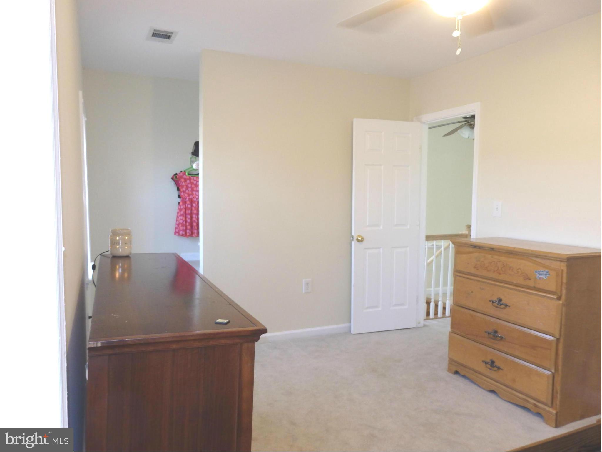 10529 White Hall Road Hagerstown, MD 21740 - Photo 15 of 29 Bedroom 2 has ceiling fan and closet alcove
