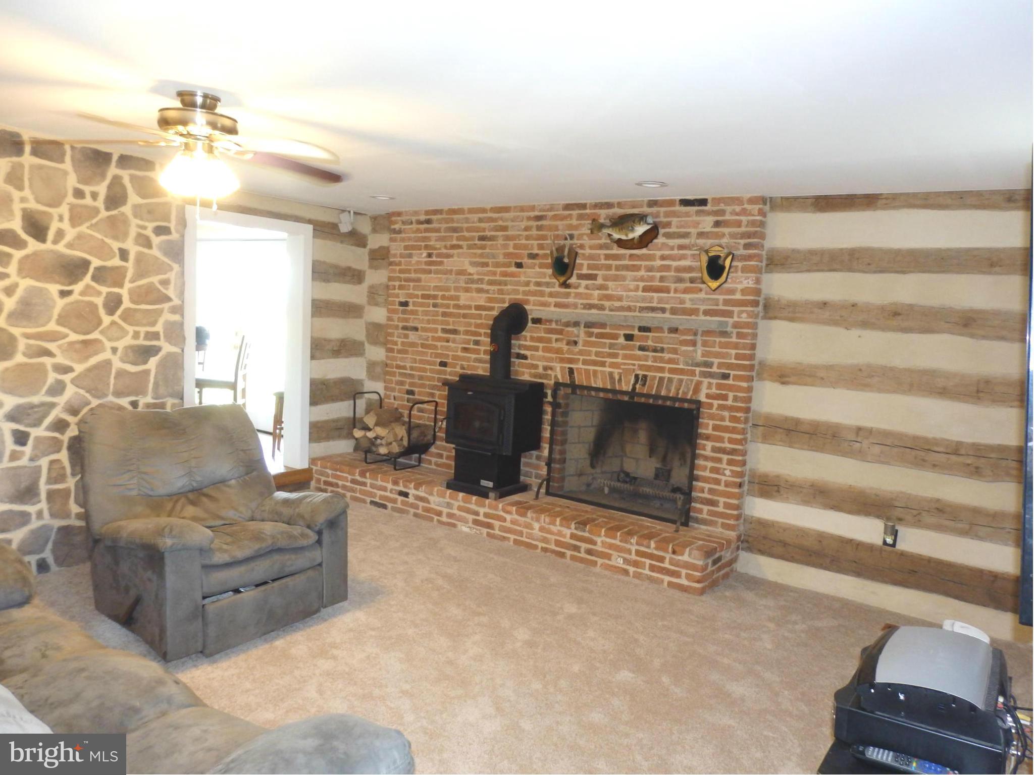 10529 White Hall Road Hagerstown, MD 21740 - Photo 3 of 29 Beautiful masonry fireplace in living room