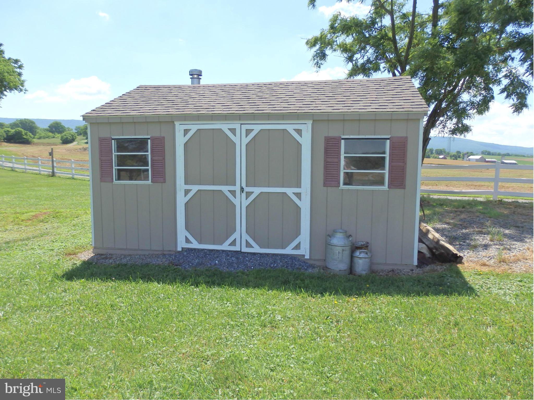 10529 White Hall Road Hagerstown, MD 21740 - Photo 27 of 29 Large shed holds lots of lawn equipment