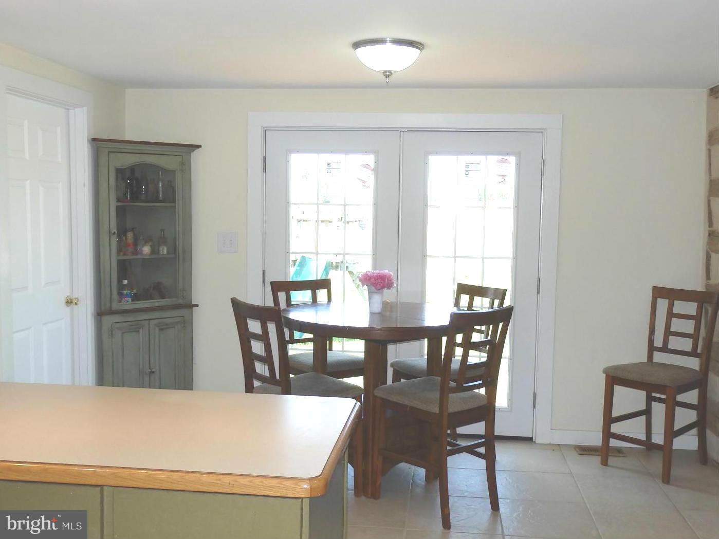 10529 White Hall Road Hagerstown, MD 21740 - Photo 9 of 29 Breakfast area has atrium door to fenced yard