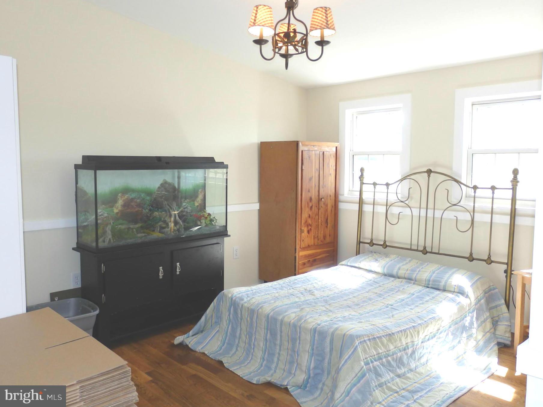 10529 White Hall Road Hagerstown, MD 21740 - Photo 10 of 29 Main level bedroom has hardwood floors