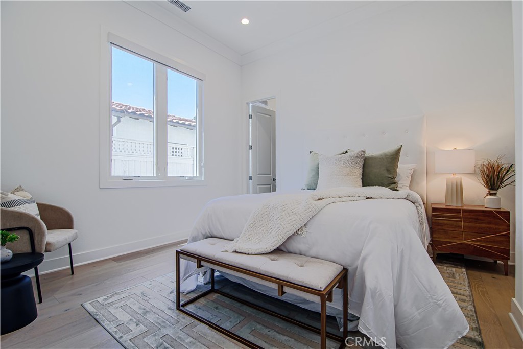 73 Chandler Ranch Road Rolling Hills Estates, CA 90274 - Photo 12 of 25 a bedroom with a bed and window