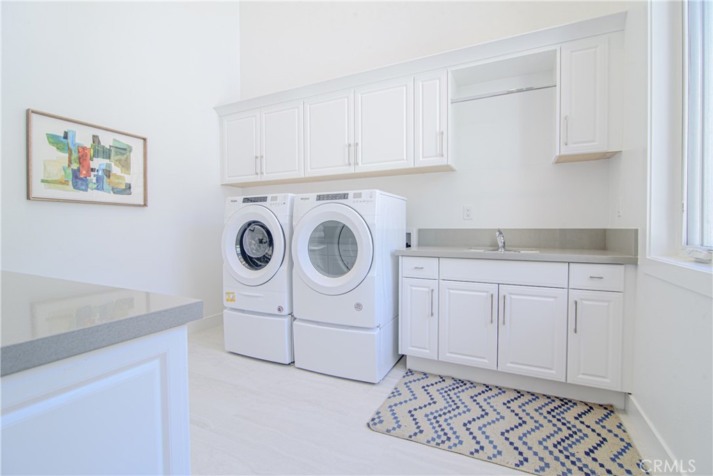 73 Chandler Ranch Road Rolling Hills Estates, CA 90274 - Photo 16 of 25 a utility room with sink dryer and washer