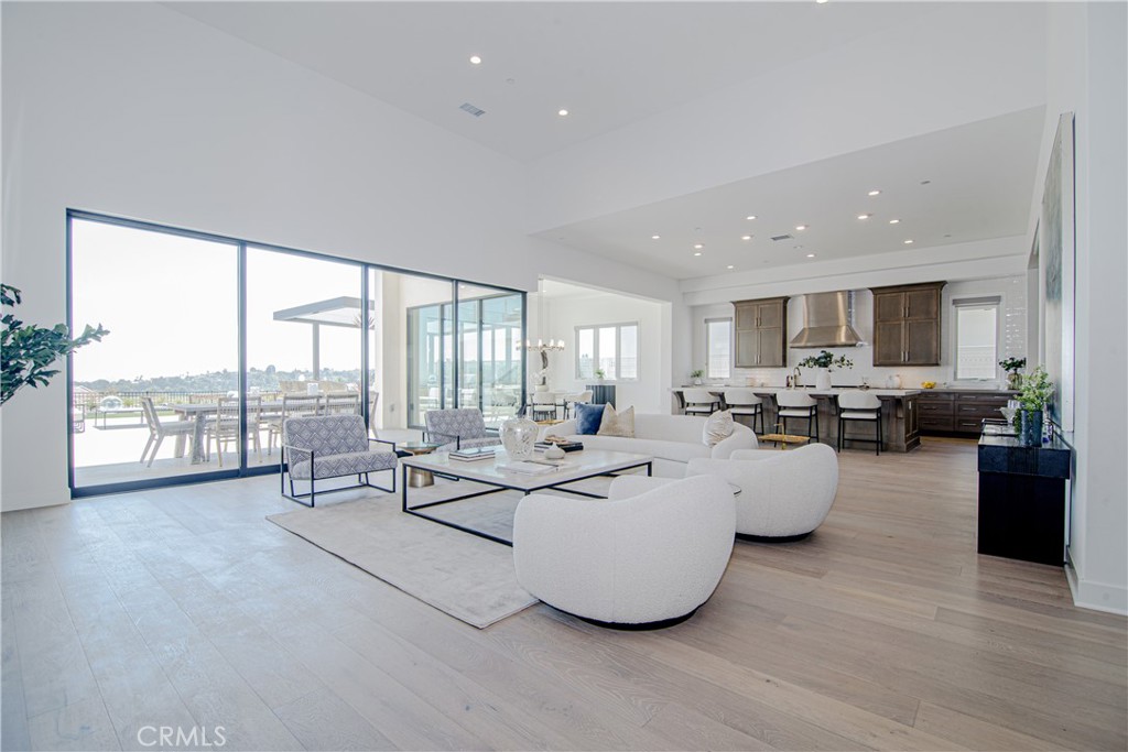 73 Chandler Ranch Road Rolling Hills Estates, CA 90274 - Photo 4 of 25 a living room with fireplace furniture and a large window