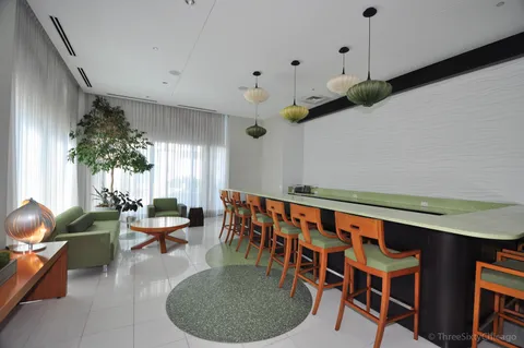 a view of a dining room with furniture