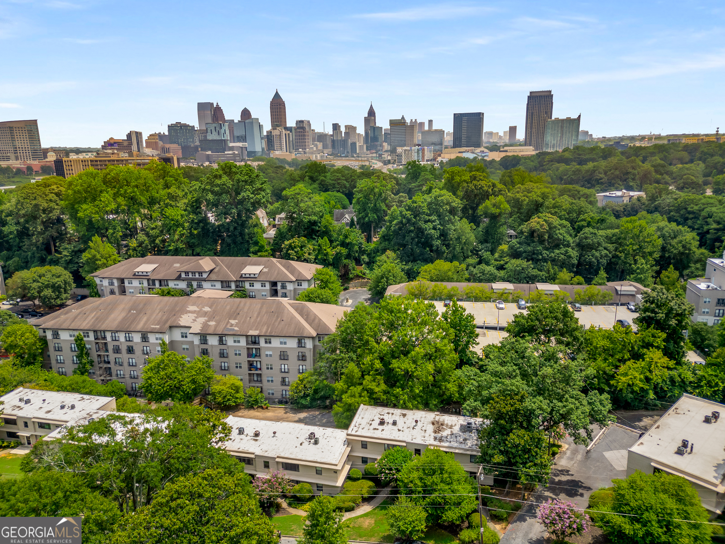 96 Ardmore Place Northwest, Unit 3 Atlanta, GA 30309 - Photo 22 of 24 a view of a city with tall buildings