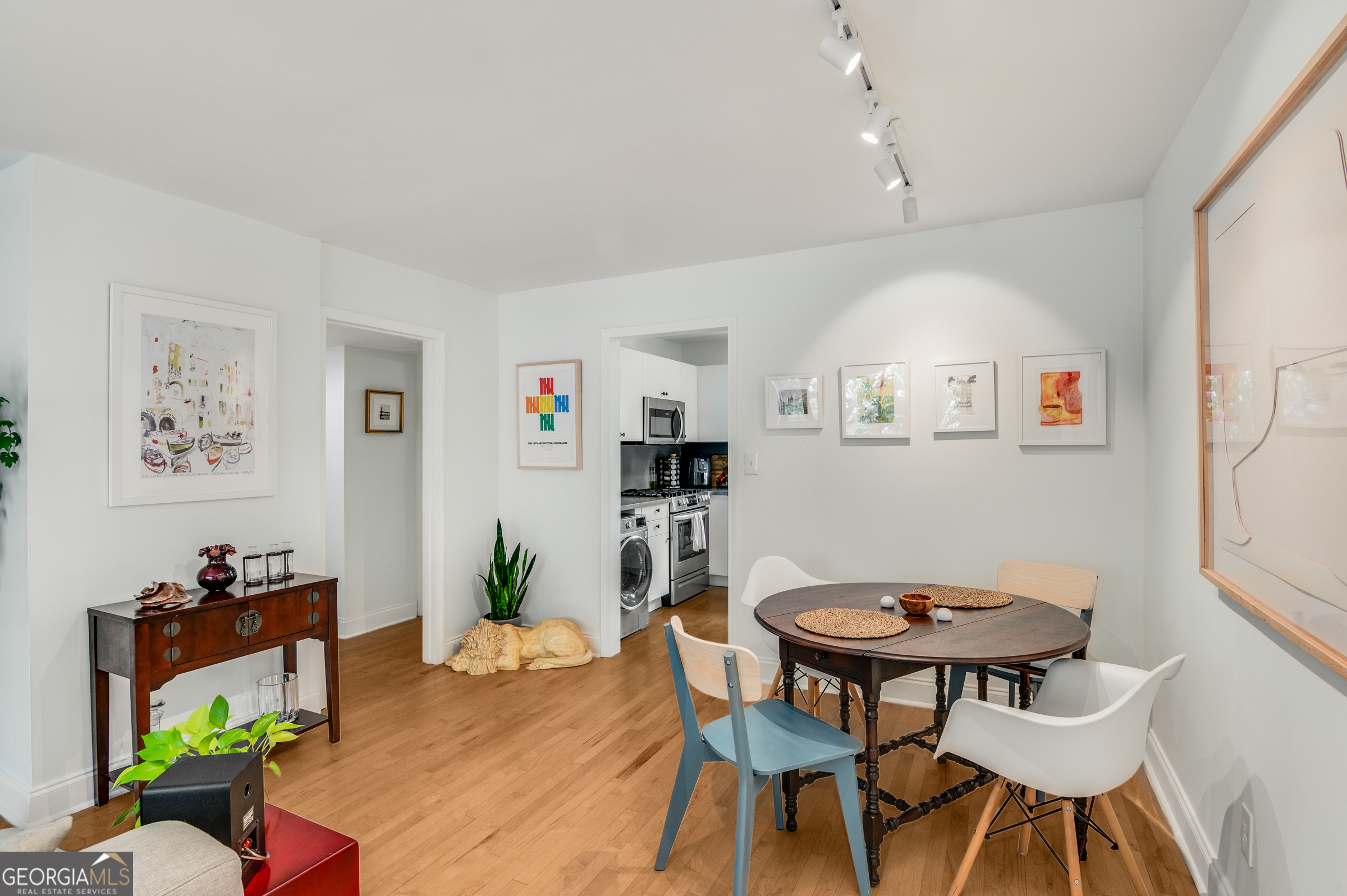 96 Ardmore Place Northwest, Unit 3 Atlanta, GA 30309 - Photo 6 of 24 a view of a dining room with furniture