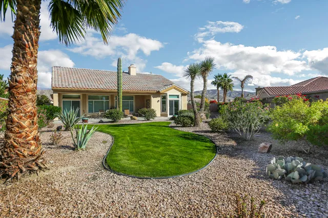 a view of a garden with a fountain