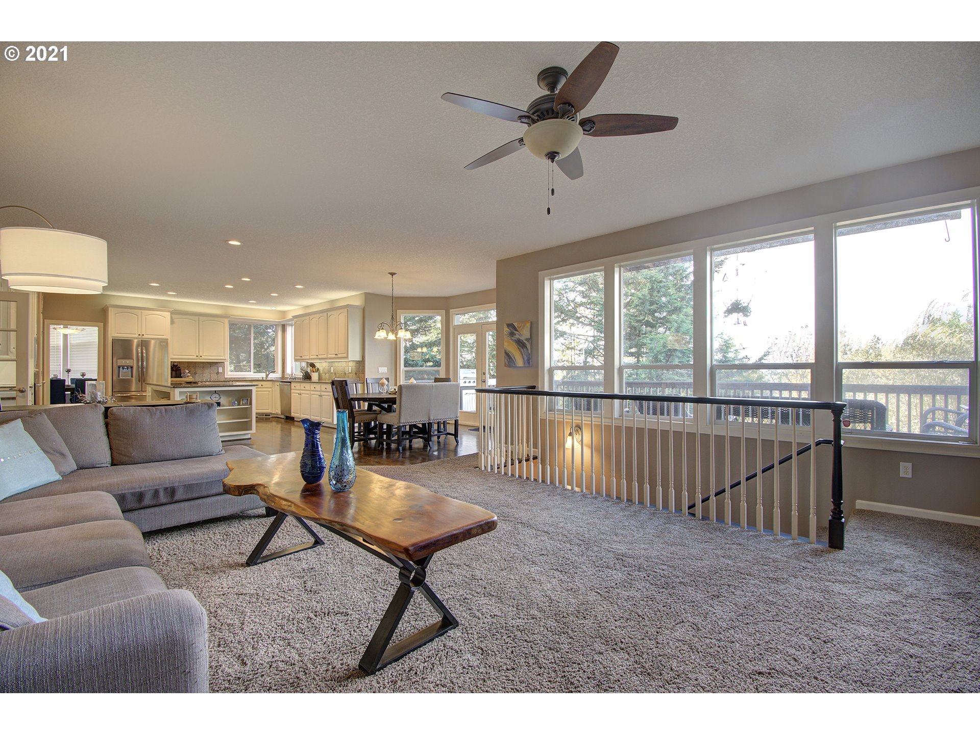 16010 Northeast 25th Avenue Ridgefield, WA 98642 - Photo 12 of 32 a living room with furniture and a large window