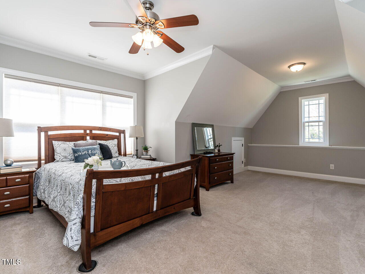 7312 Ridgeline Drive Raleigh, NC 27613 - Photo 37 of 83 a bed room with a bed and a window