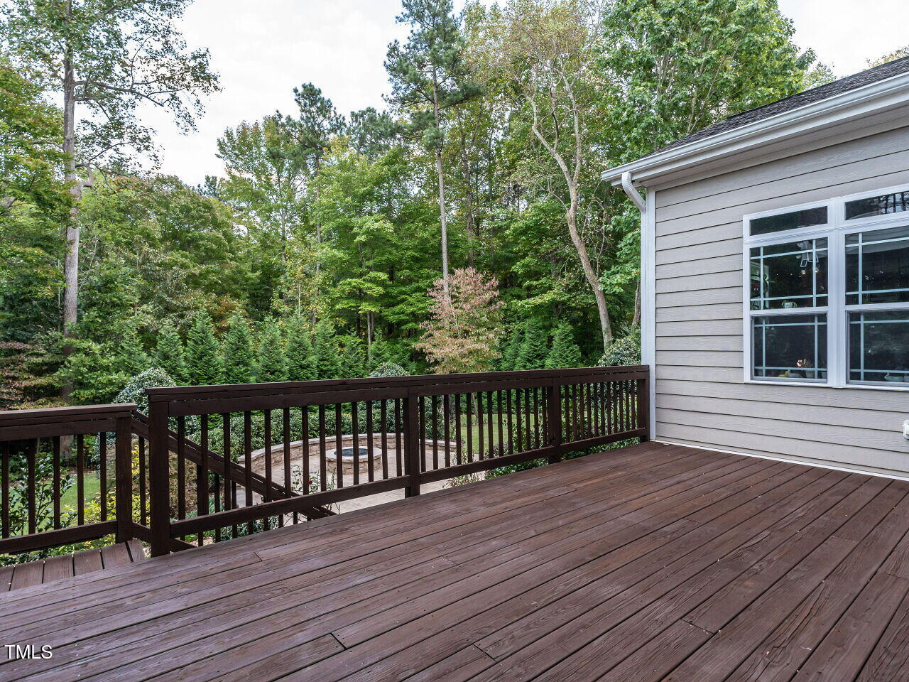 7312 Ridgeline Drive Raleigh, NC 27613 - Photo 61 of 83 a balcony with wooden floor and fence