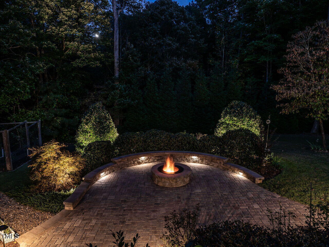 7312 Ridgeline Drive Raleigh, NC 27613 - Photo 66 of 83 a view of a backyard with lots of green space and trees