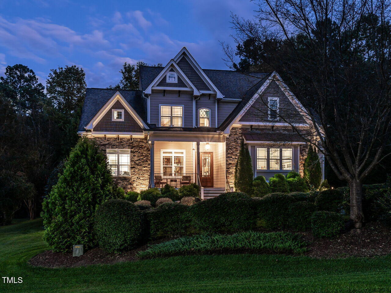 7312 Ridgeline Drive Raleigh, NC 27613 - Photo 4 of 83 a front view of a house with a yard