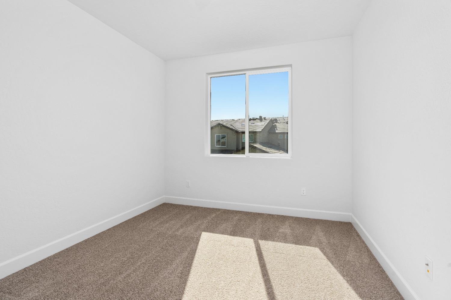 275 Huckleberry Road South Madera, CA 93636 - Photo 14 of 34 an empty room with a bench