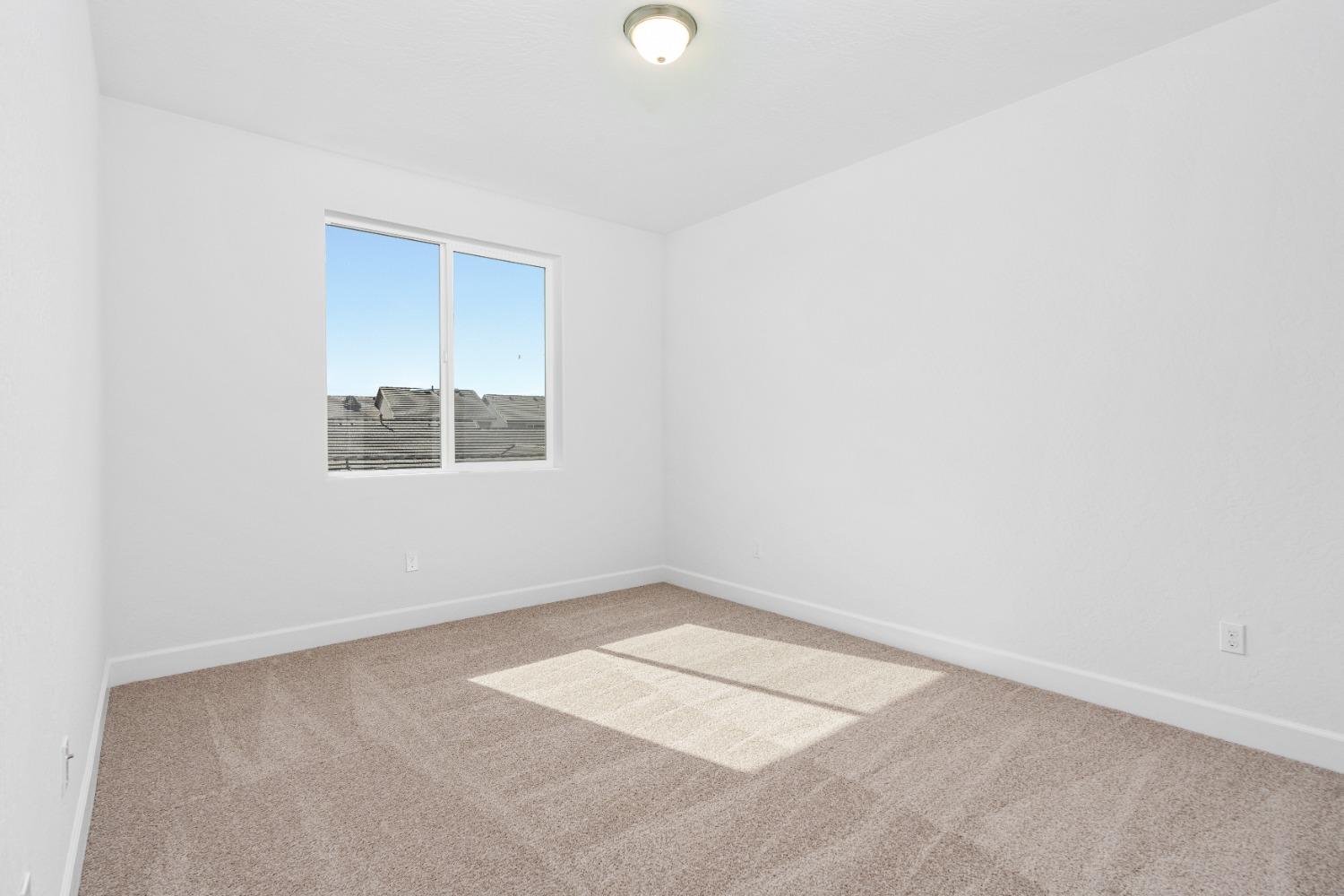 275 Huckleberry Road South Madera, CA 93636 - Photo 15 of 34 an empty room with a window