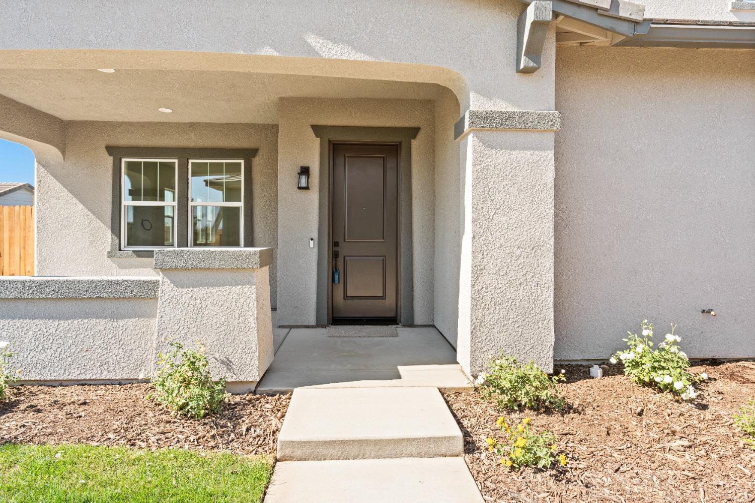 275 Huckleberry Road South Madera, CA 93636 - Photo 20 of 34 a front view of a house
