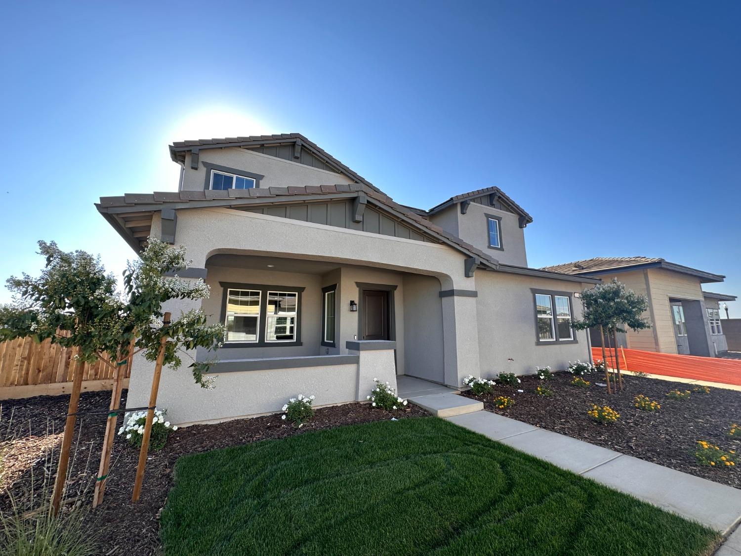 275 Huckleberry Road South Madera, CA 93636 - Photo 3 of 34 a front view of a house with a yard