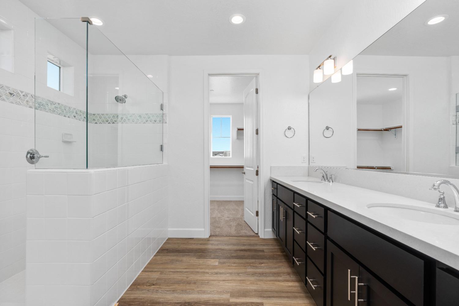 275 Huckleberry Road South Madera, CA 93636 - Photo 9 of 34 a spacious bathroom with a double vanity sink mirror and shower