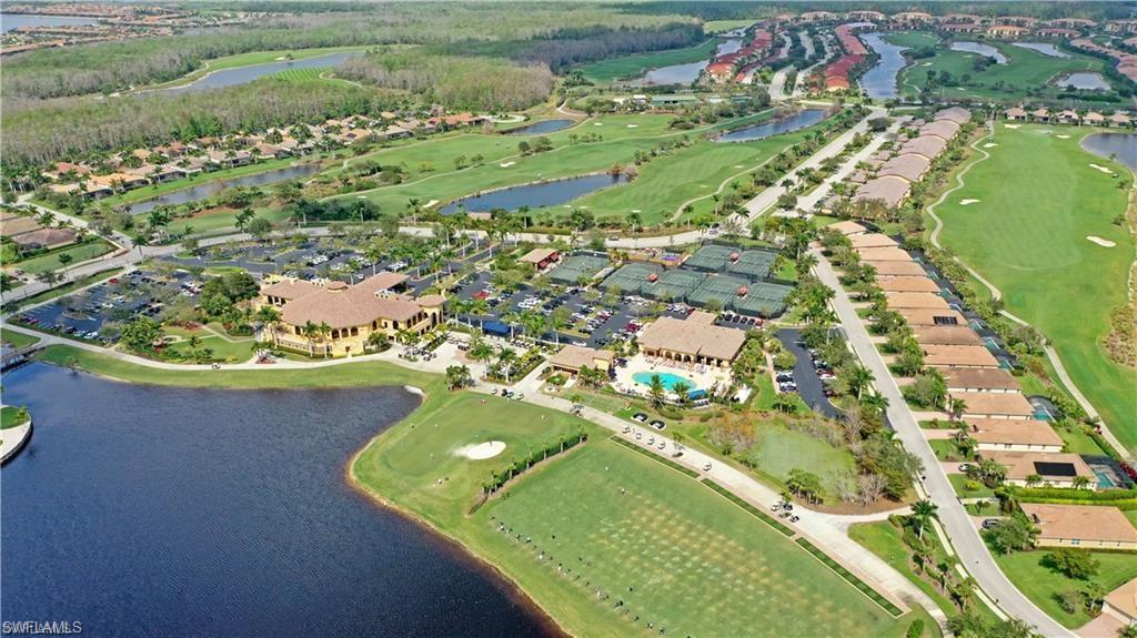 10353 Heritage Bay Boulevard, Unit 2226 Naples, FL 34120 - Photo 36 of 40 a view of a lake