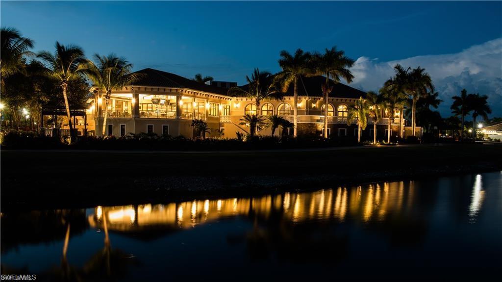 10353 Heritage Bay Boulevard, Unit 2226 Naples, FL 34120 - Photo 39 of 40 a view of a swimming pool from a balcony