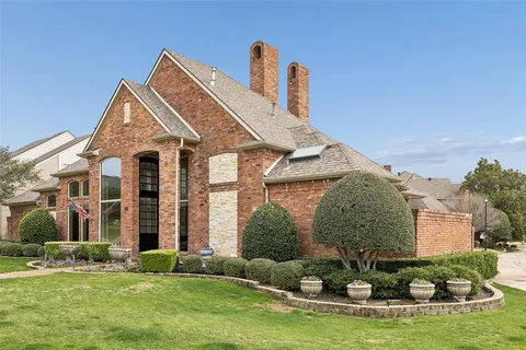 a front view of a house with swimming pool