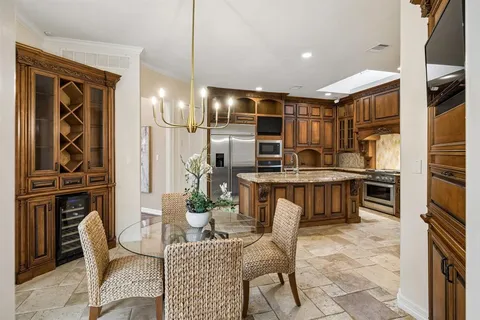 a view of living room with granite countertop furniture and a floor to ceiling window