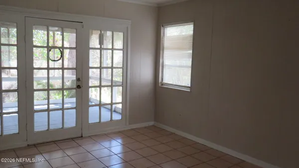 an empty room with windows
