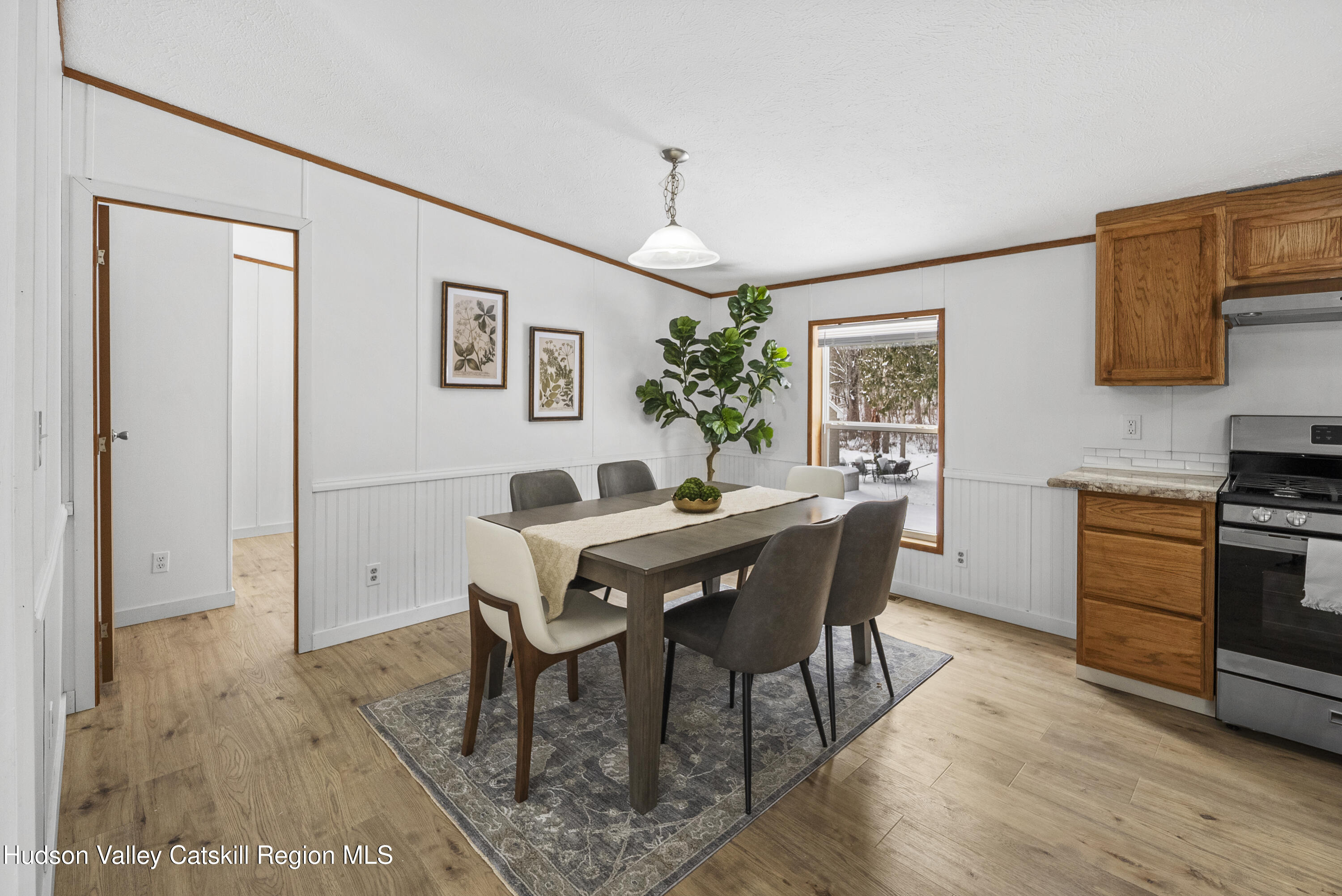3701 Galway Road, Unit 5 Ballston Spa, NY 12020 - Photo 12 of 47 a view of a dining room with furniture window and wooden floor