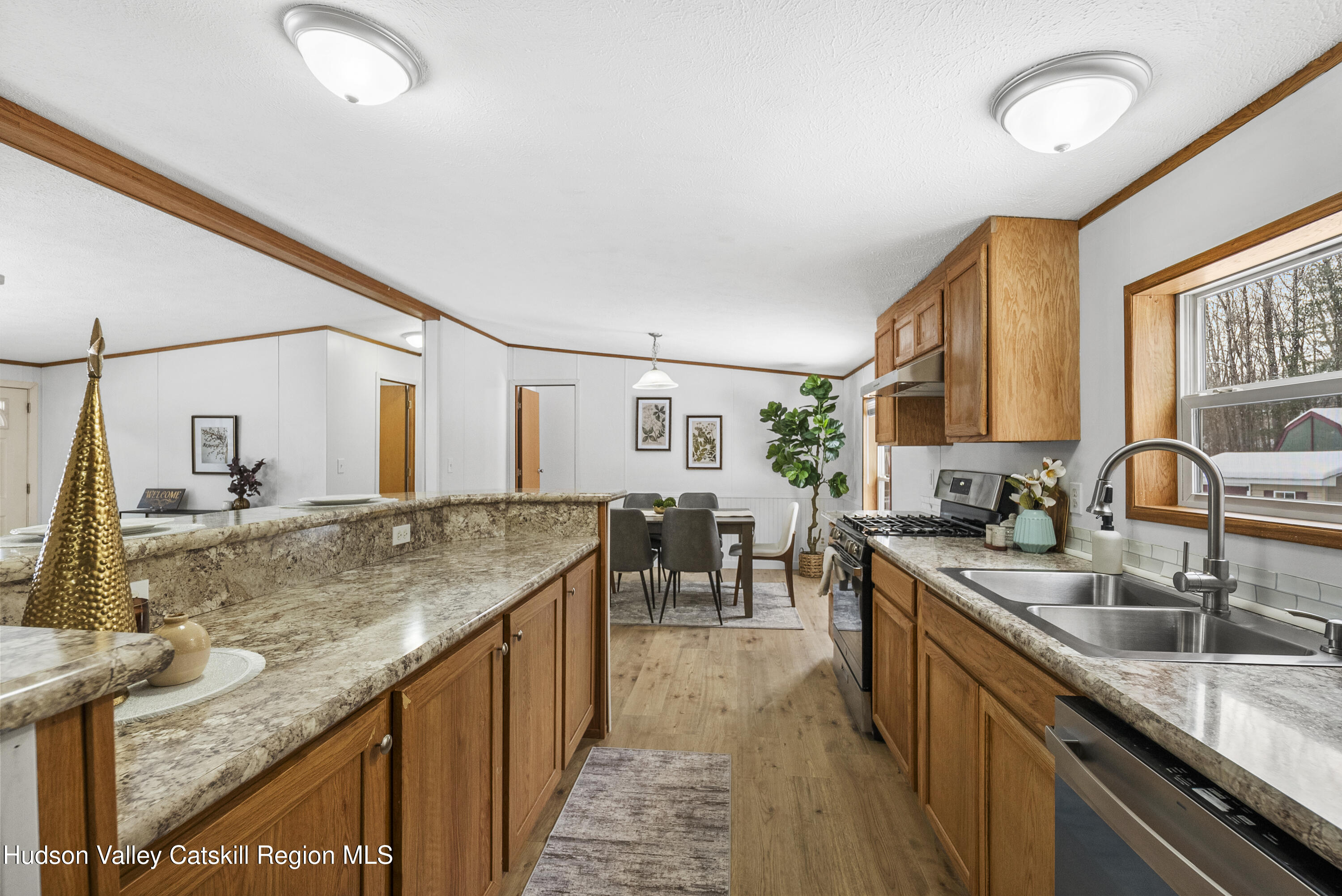 3701 Galway Road, Unit 5 Ballston Spa, NY 12020 - Photo 15 of 47 a kitchen with stainless steel appliances granite countertop sink stove top oven and cabinets