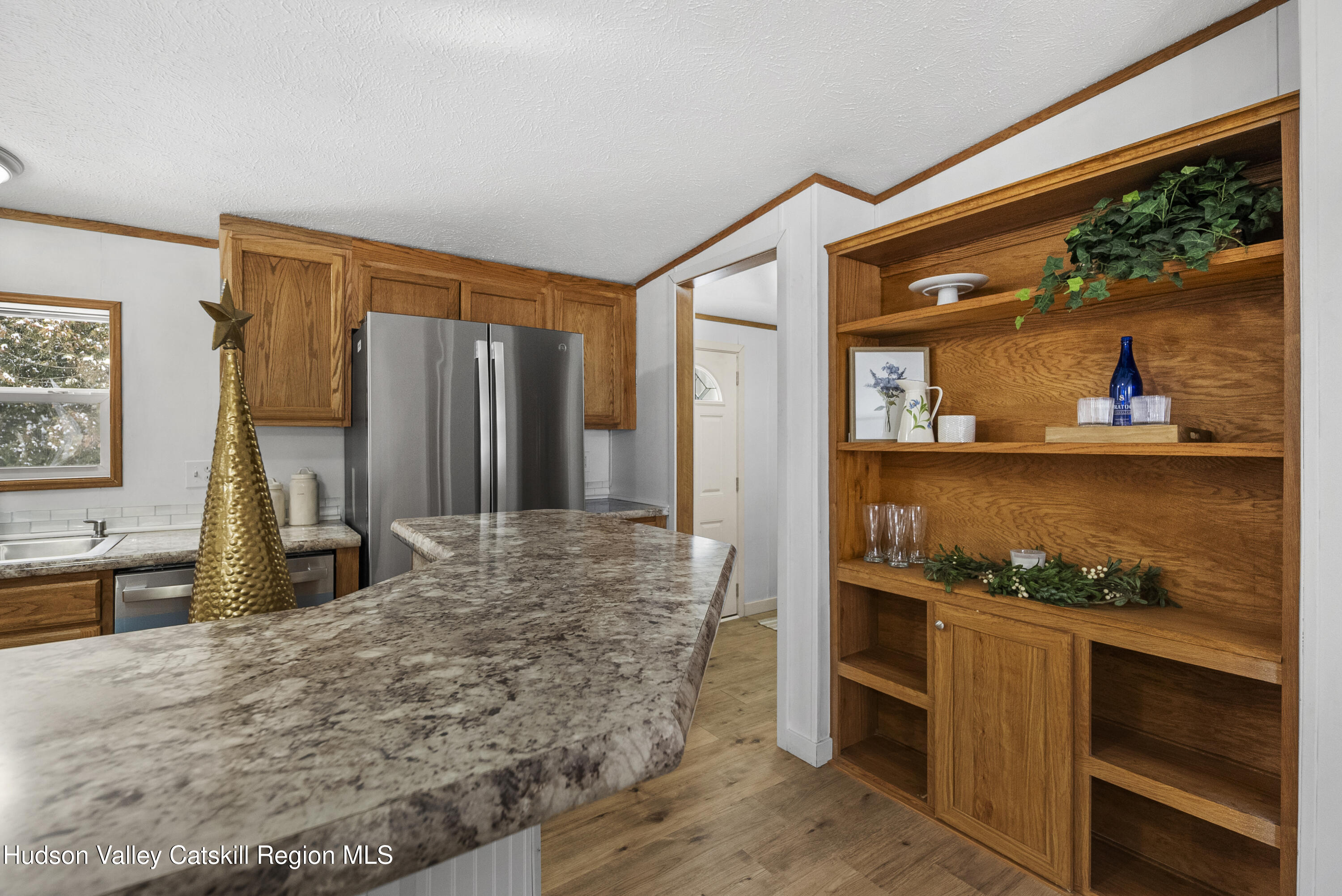 3701 Galway Road, Unit 5 Ballston Spa, NY 12020 - Photo 18 of 47 a kitchen with stainless steel appliances granite countertop a refrigerator and a stove top oven