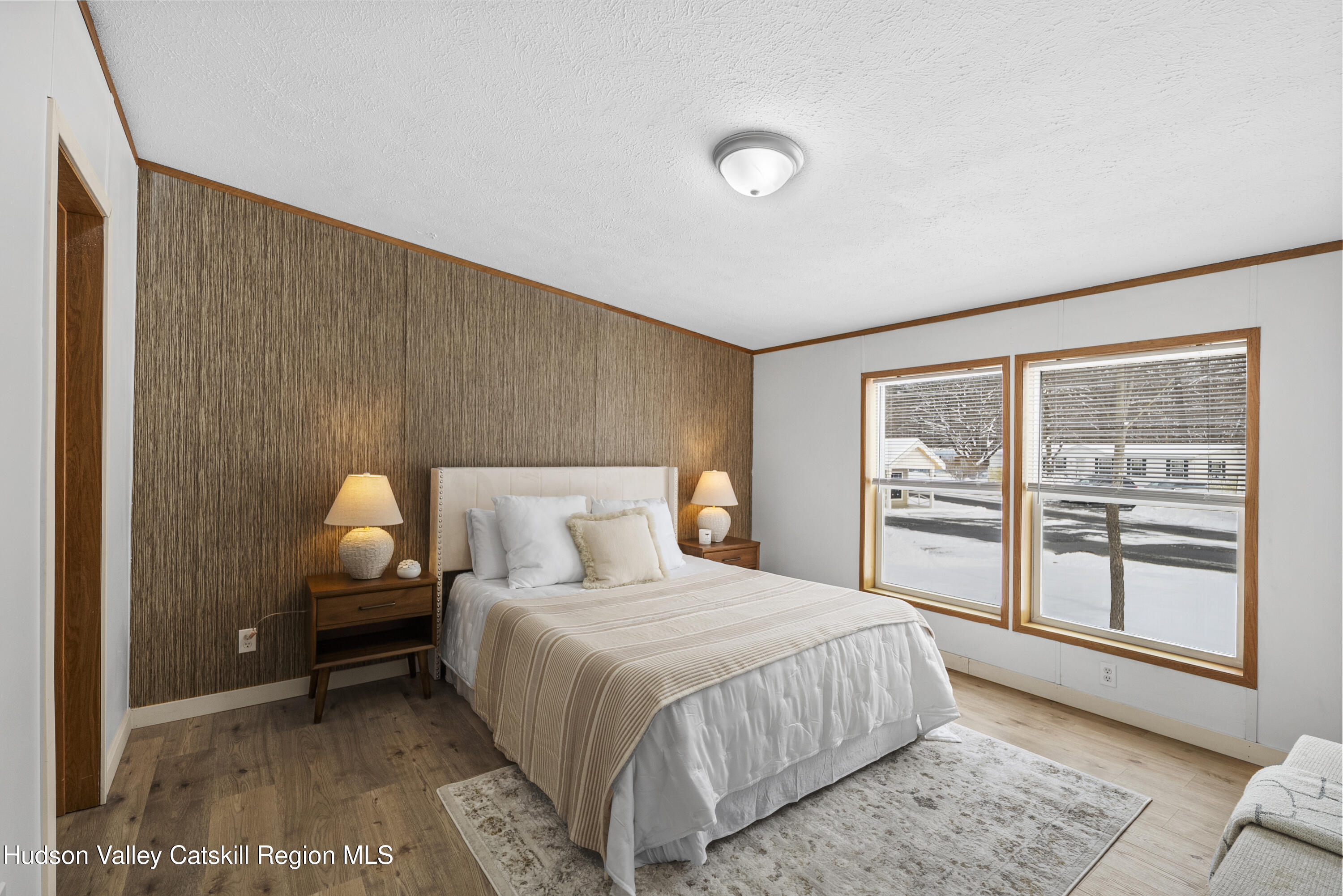 3701 Galway Road, Unit 5 Ballston Spa, NY 12020 - Photo 22 of 47 a bedroom with a bed and a large window