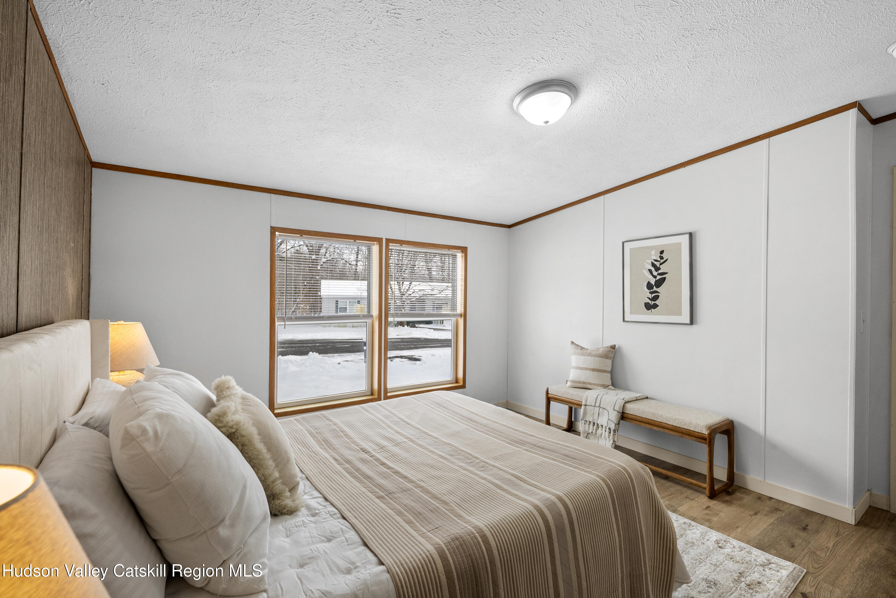 3701 Galway Road, Unit 5 Ballston Spa, NY 12020 - Photo 23 of 47 a bedroom with a bed and a lamp with window