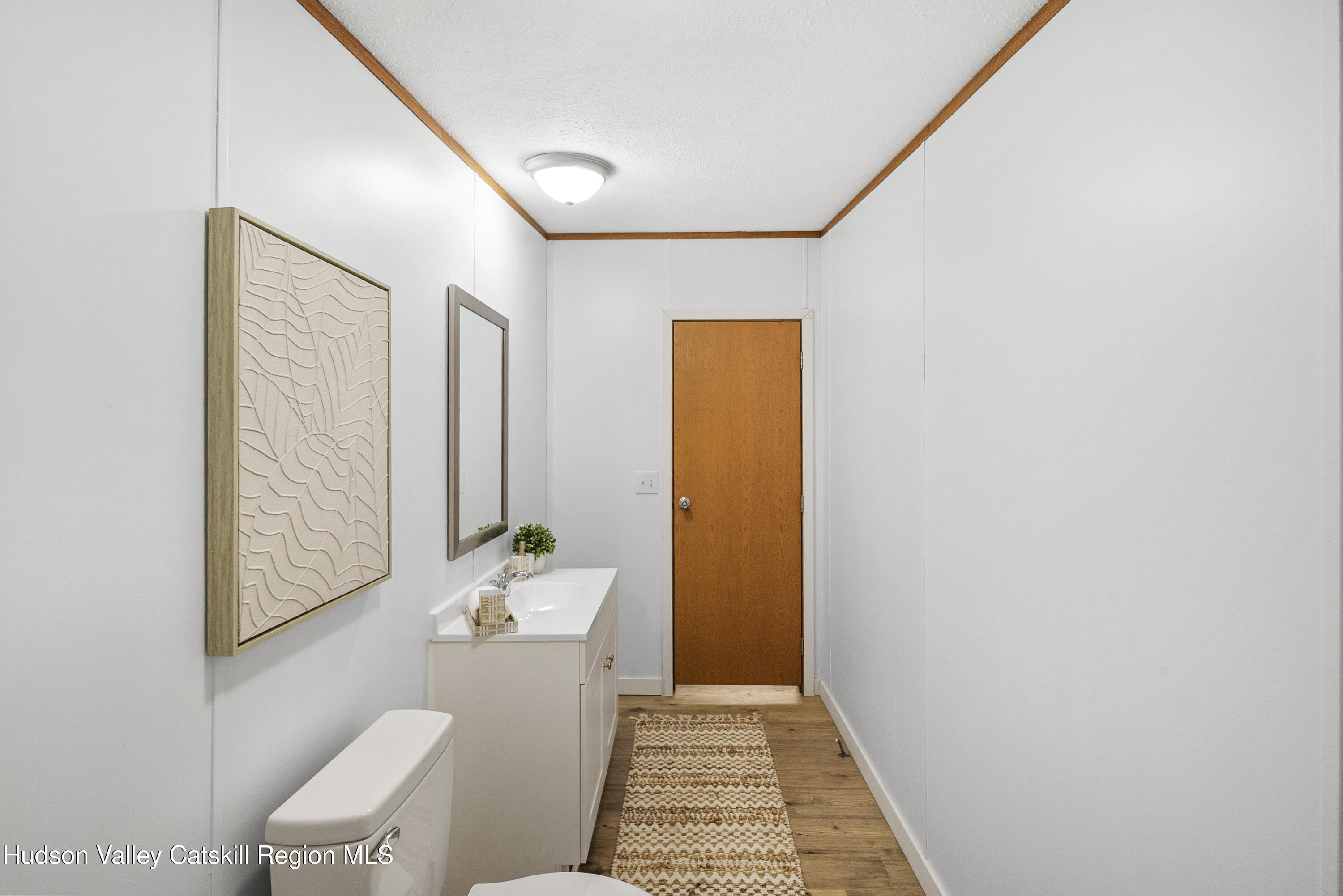 3701 Galway Road, Unit 5 Ballston Spa, NY 12020 - Photo 27 of 47 a bathroom with a sink and a mirror