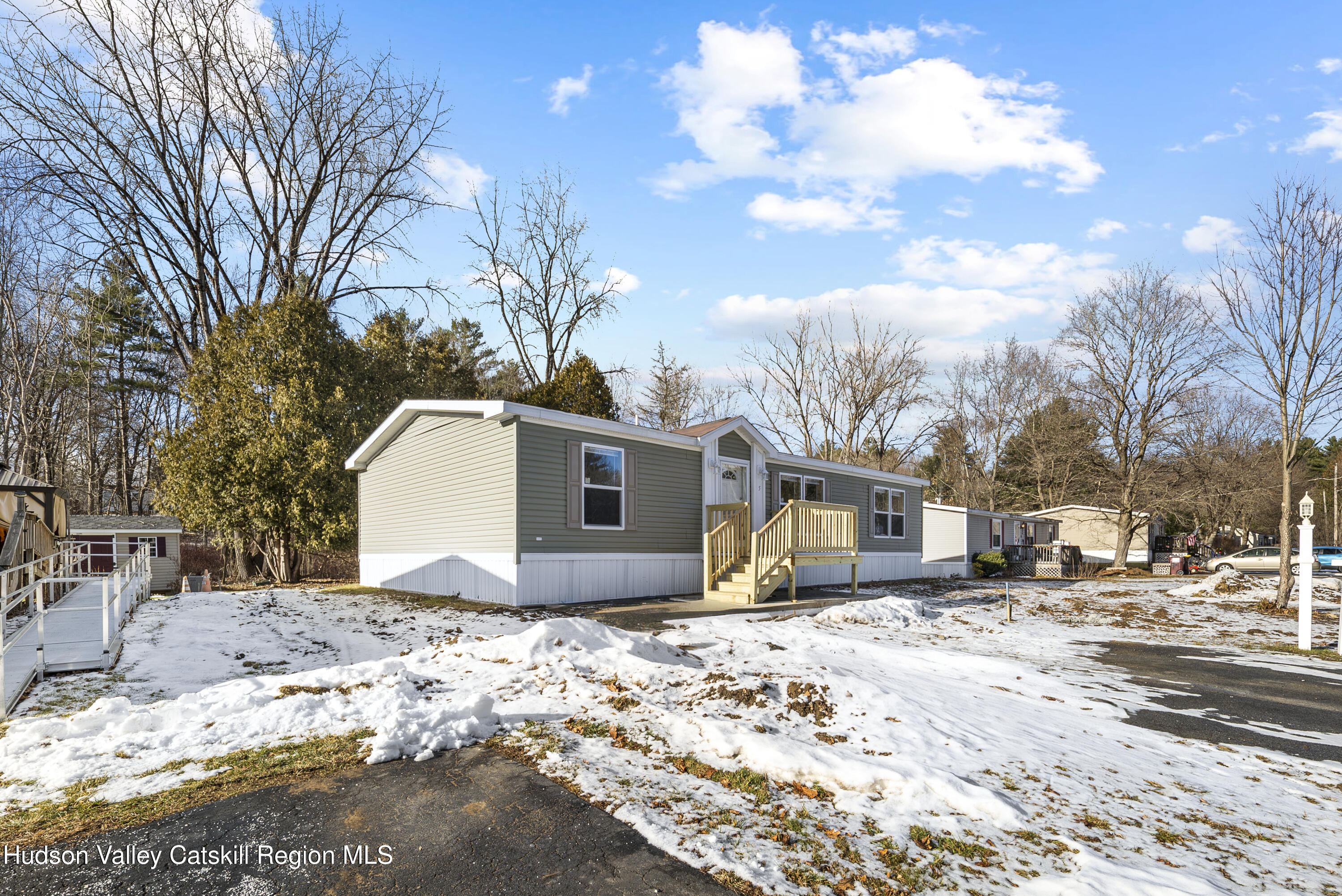 3701 Galway Road, Unit 5 Ballston Spa, NY 12020 - Photo 44 of 47 a view of a white house with a yard