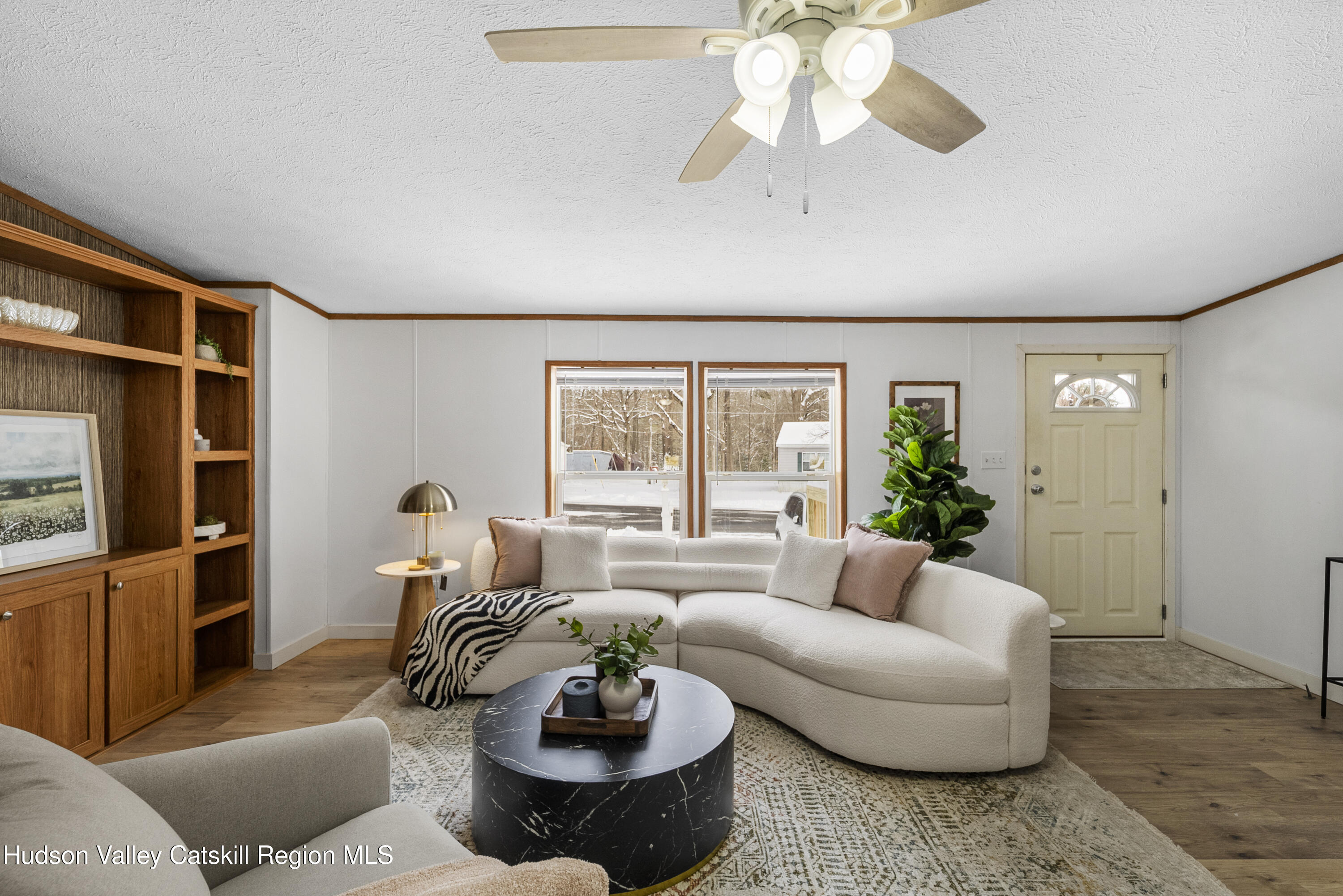 3701 Galway Road, Unit 5 Ballston Spa, NY 12020 - Photo 5 of 47 a living room with furniture potted plant and a window