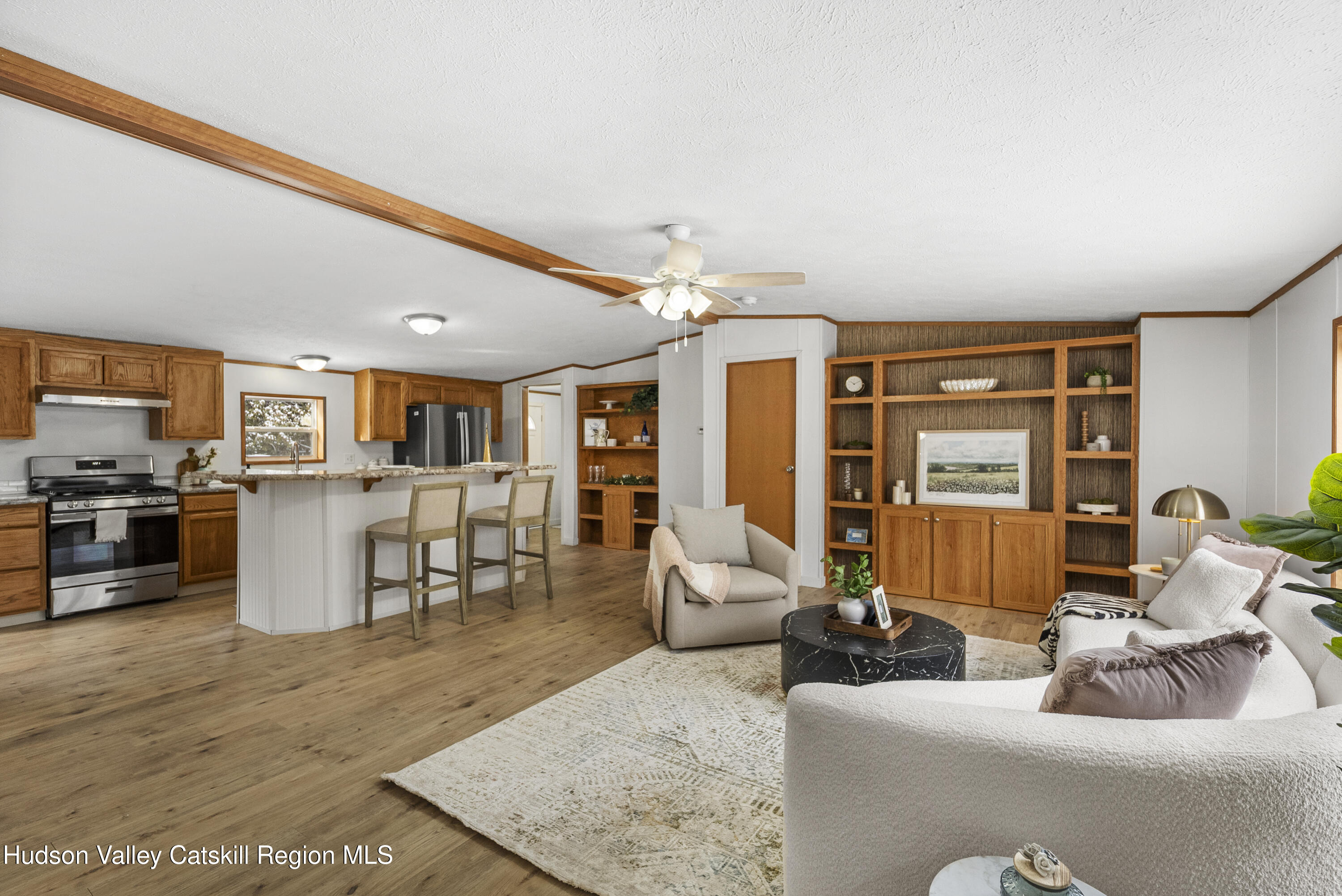 3701 Galway Road, Unit 5 Ballston Spa, NY 12020 - Photo 8 of 47 a living room with furniture and wooden floor