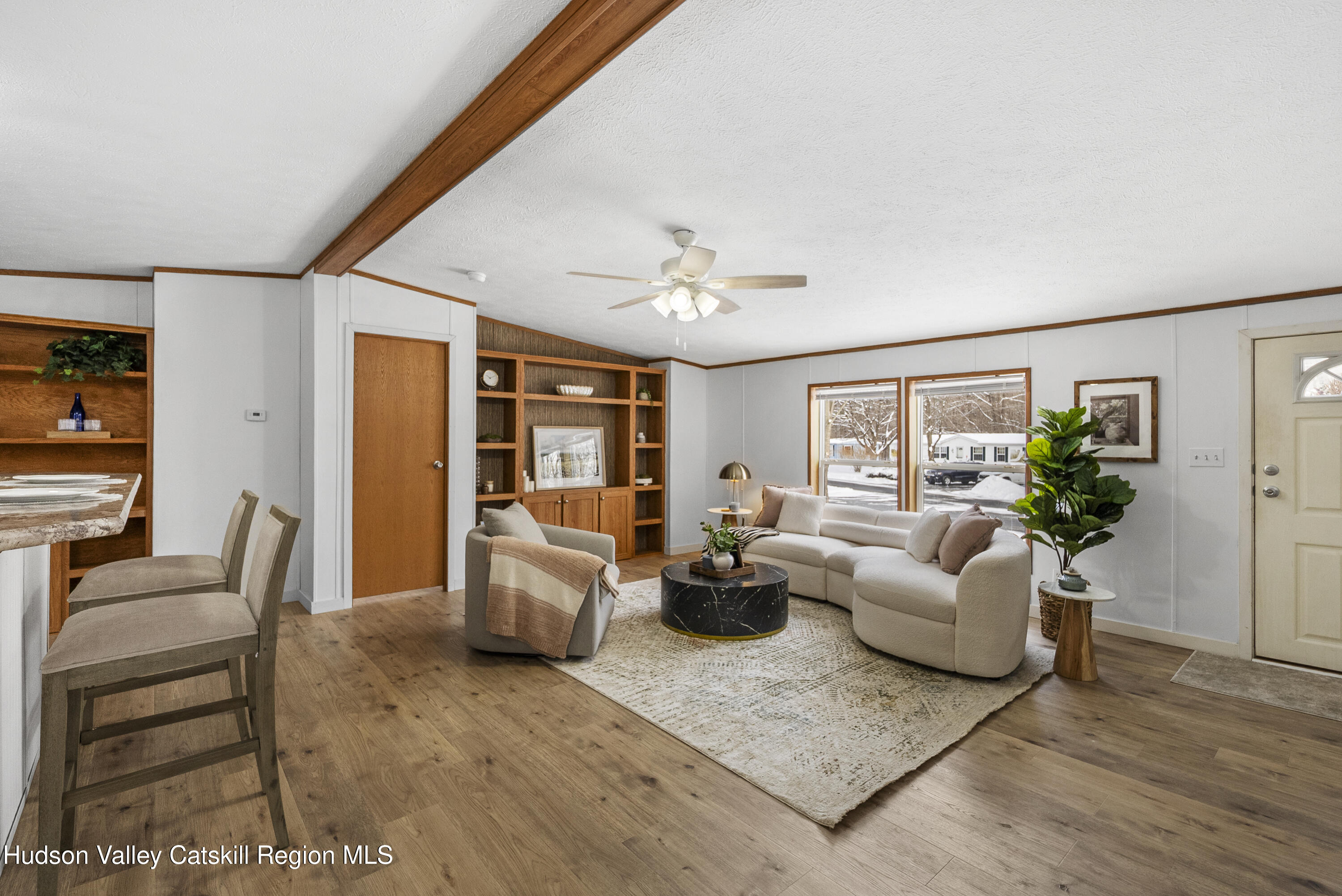 3701 Galway Road, Unit 5 Ballston Spa, NY 12020 - Photo 9 of 47 a living room with furniture and wooden floor