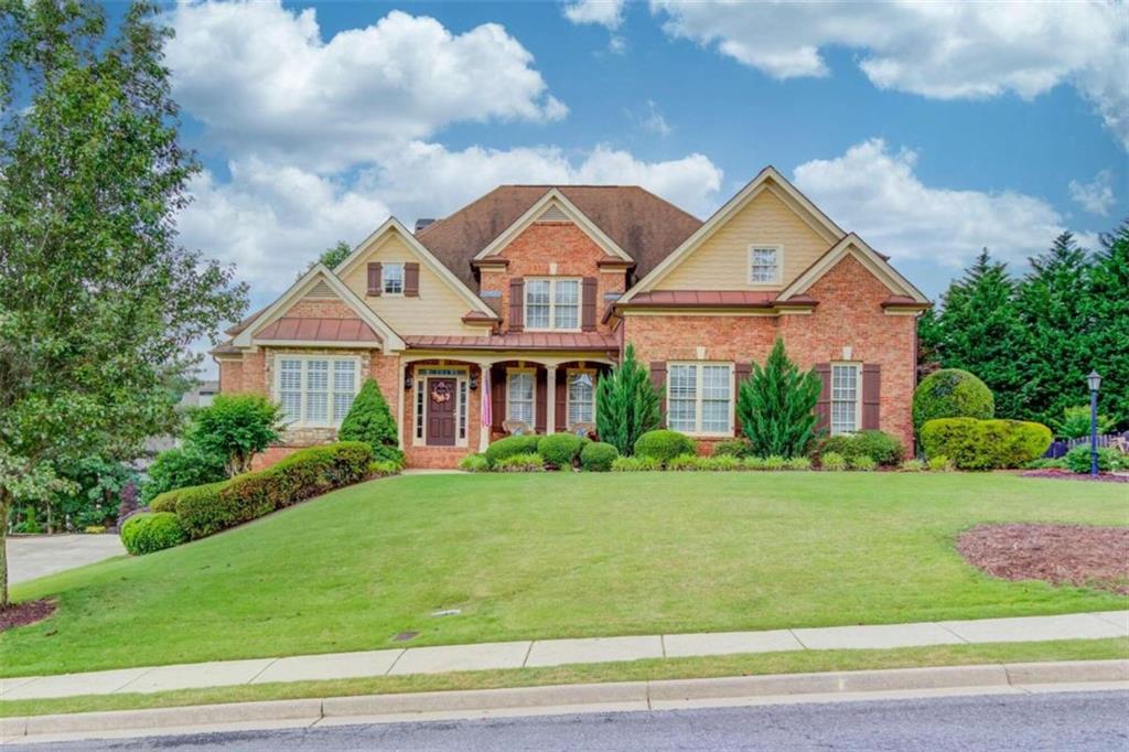 2272 Floral Ridge Drive Dacula, GA 30019 - Photo 1 of 1 a front view of a house with a yard
