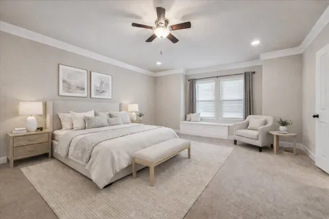 a spacious bedroom with a bed and window
