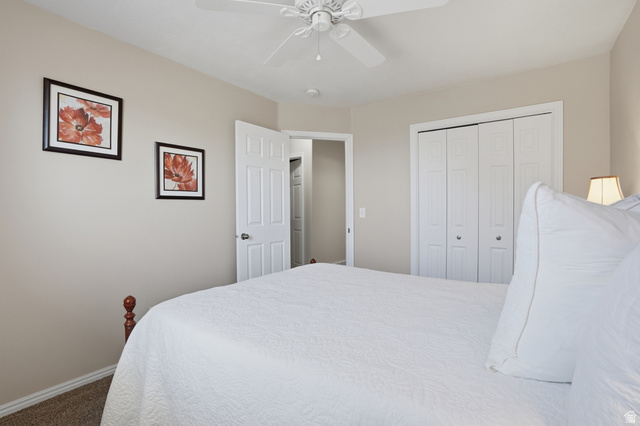 7737 Ranches Parkway Eagle Mountain, UT 84005 - Photo 14 of 28 Interior room featuring neutral wall paint, a ceiling fan with integrated lighting, and carpeted flooring