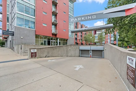 a view of a building with a yard