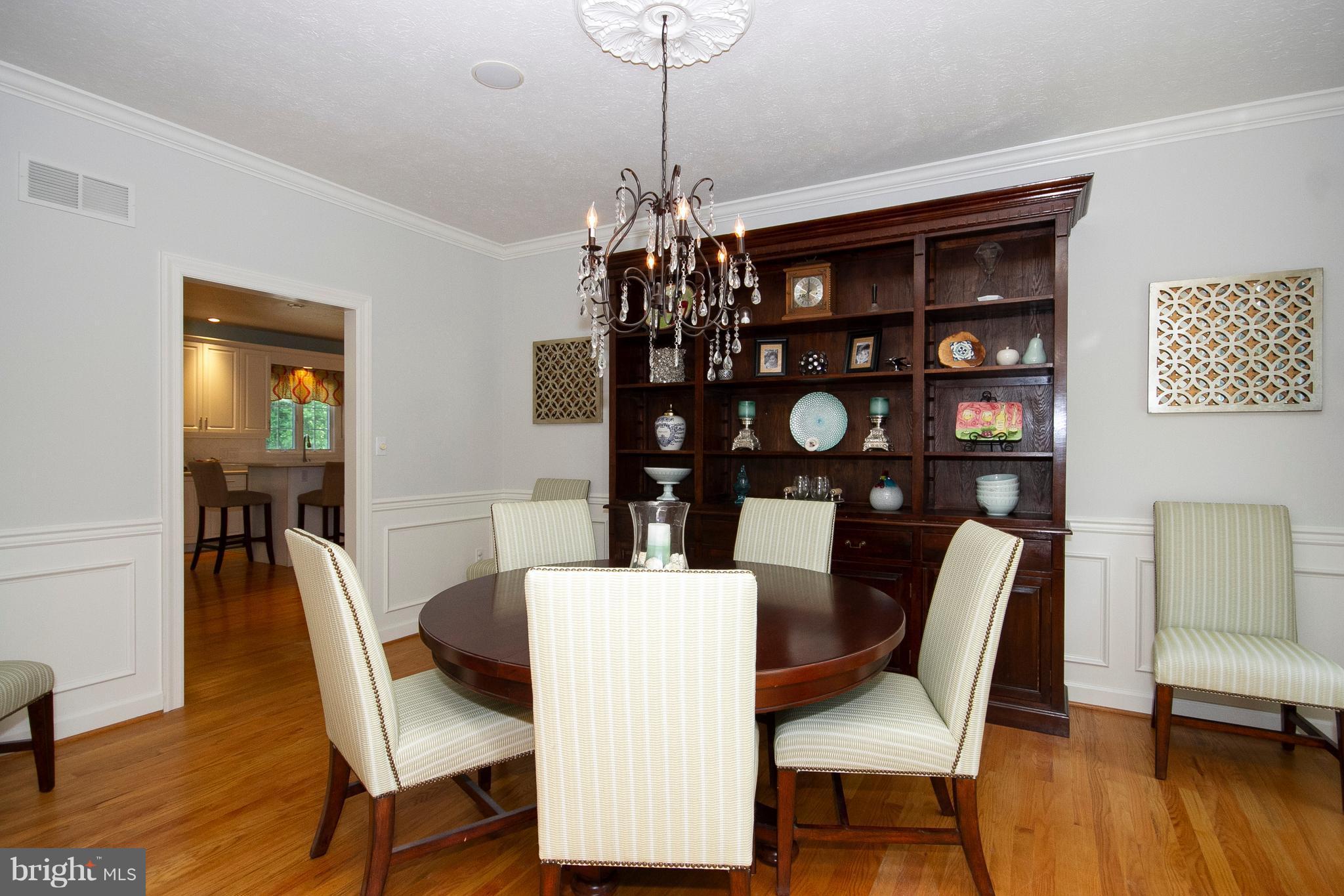 2818 Paper Mill Road Phoenix, MD 21131 - Photo 11 of 30 a view of a dining room with furniture wooden floor and chandelier
