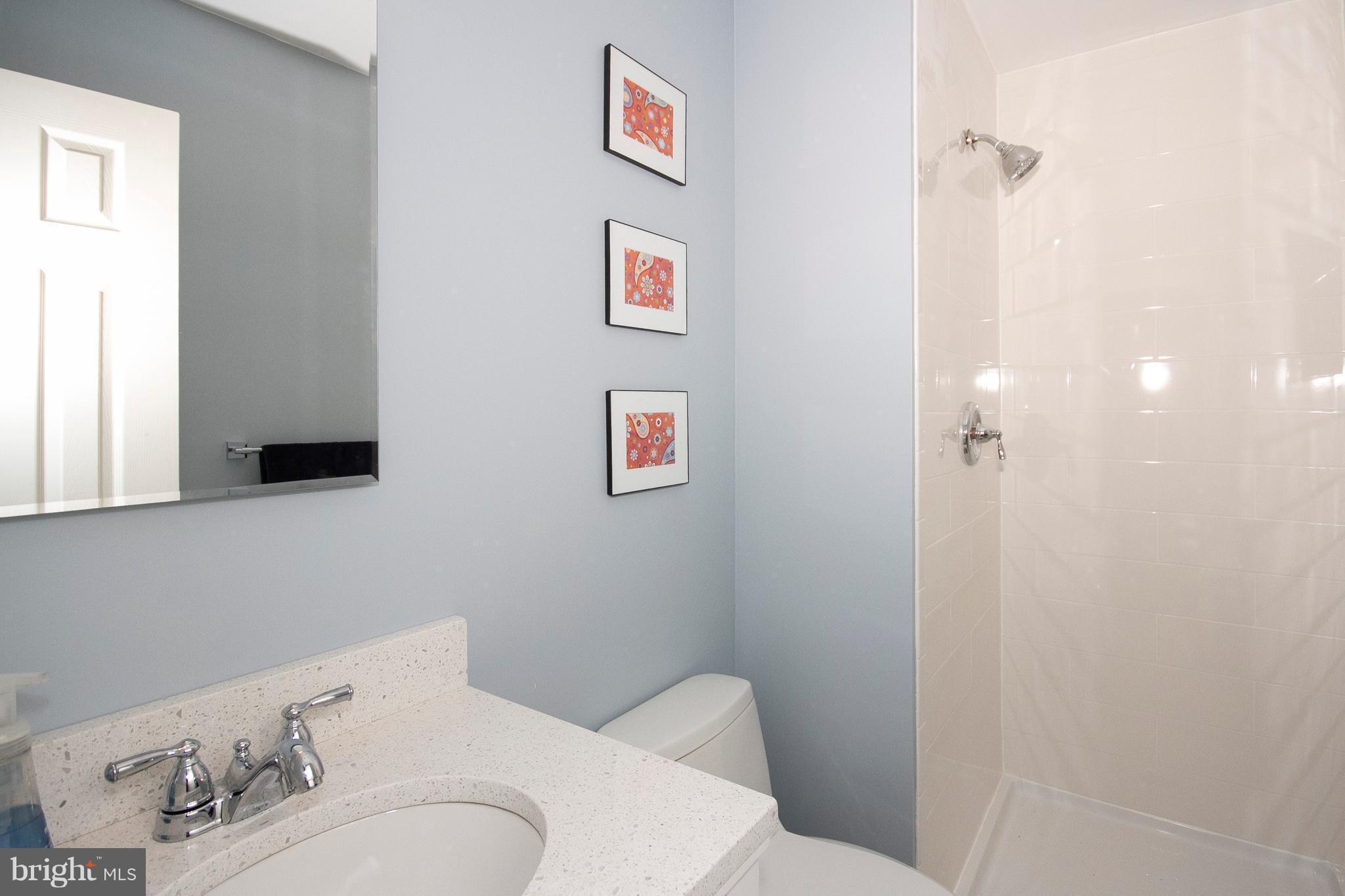 2818 Paper Mill Road Phoenix, MD 21131 - Photo 19 of 30 a bathroom with a toilet and a shower