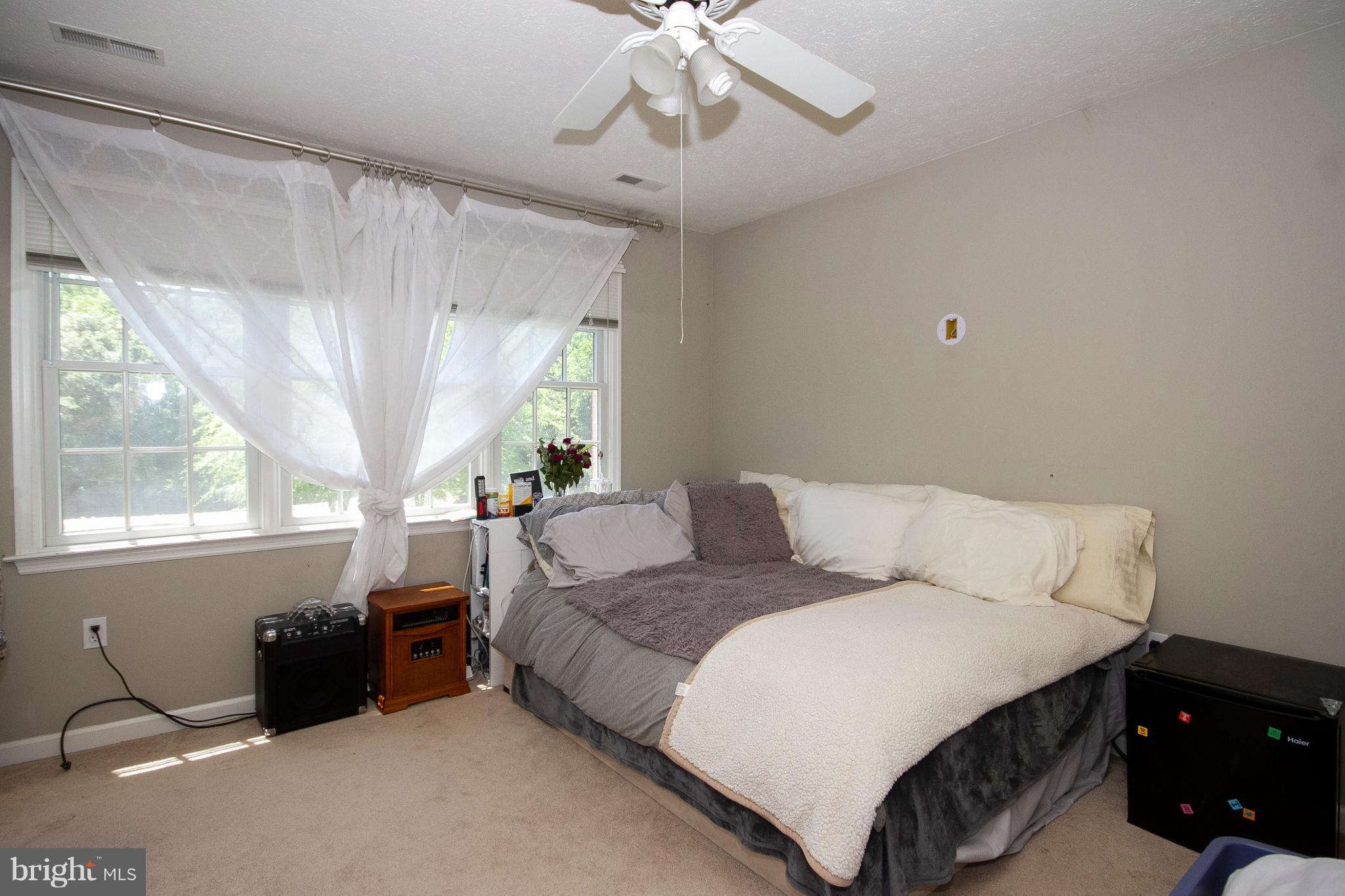 2818 Paper Mill Road Phoenix, MD 21131 - Photo 21 of 30 a living room with furniture and a large window