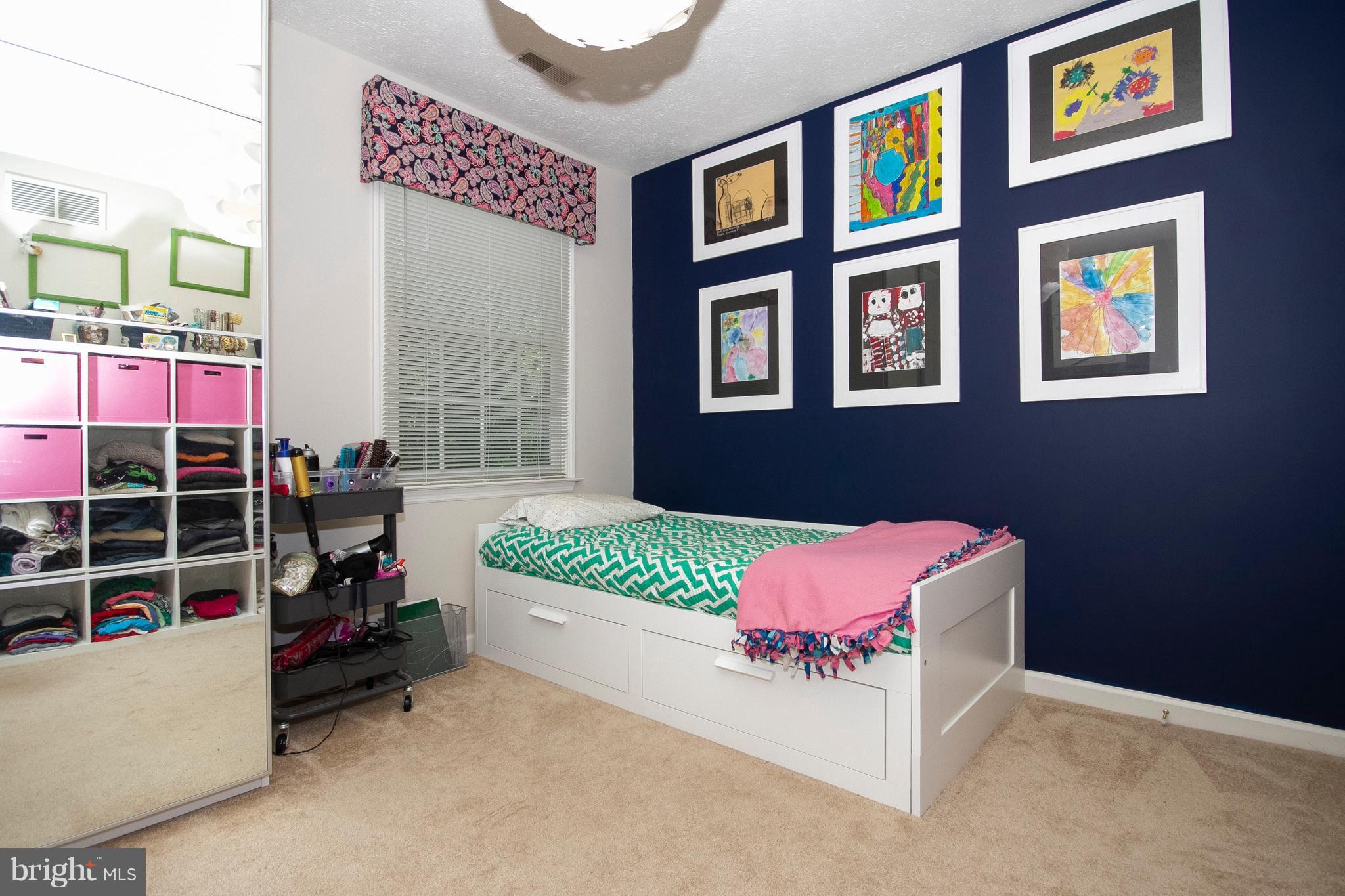 2818 Paper Mill Road Phoenix, MD 21131 - Photo 23 of 30 a bedroom with a bed and a window