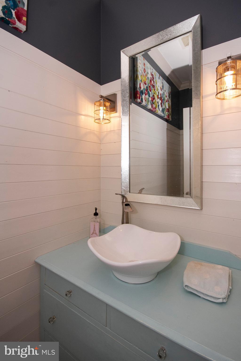 2818 Paper Mill Road Phoenix, MD 21131 - Photo 26 of 30 a bathroom with a sink and a mirror