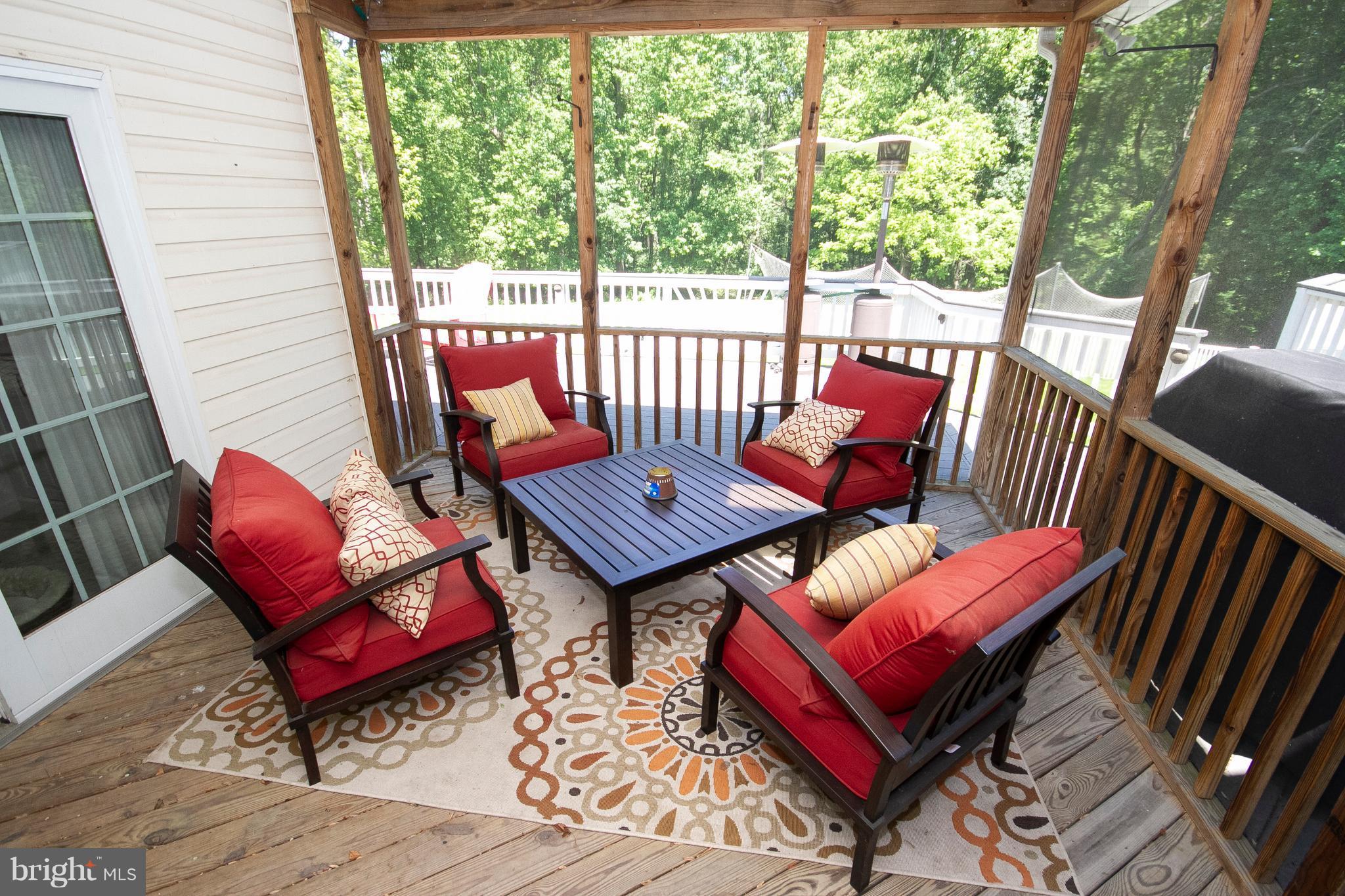 2818 Paper Mill Road Phoenix, MD 21131 - Photo 27 of 30 a outdoor living room with furniture and a rug